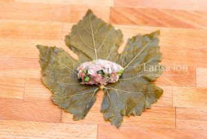 Steps of cooking dolma(tolma, sarma) from grape leaves stuffed with minced meat and rice.