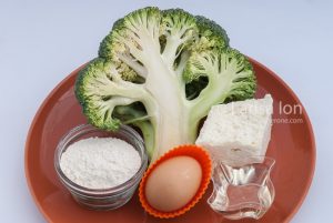 Cooking ingredients: fresh broccoli, brinza cheese, egg, sunflower oil and flour