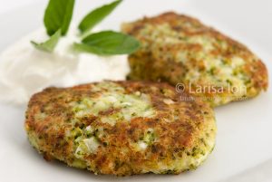 Broccoli and cheese pancakes served with Greek yogurt