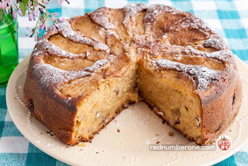 Apple cake served on a white plate closeup